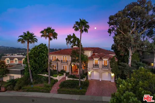 a view of house with patio outdoor seating