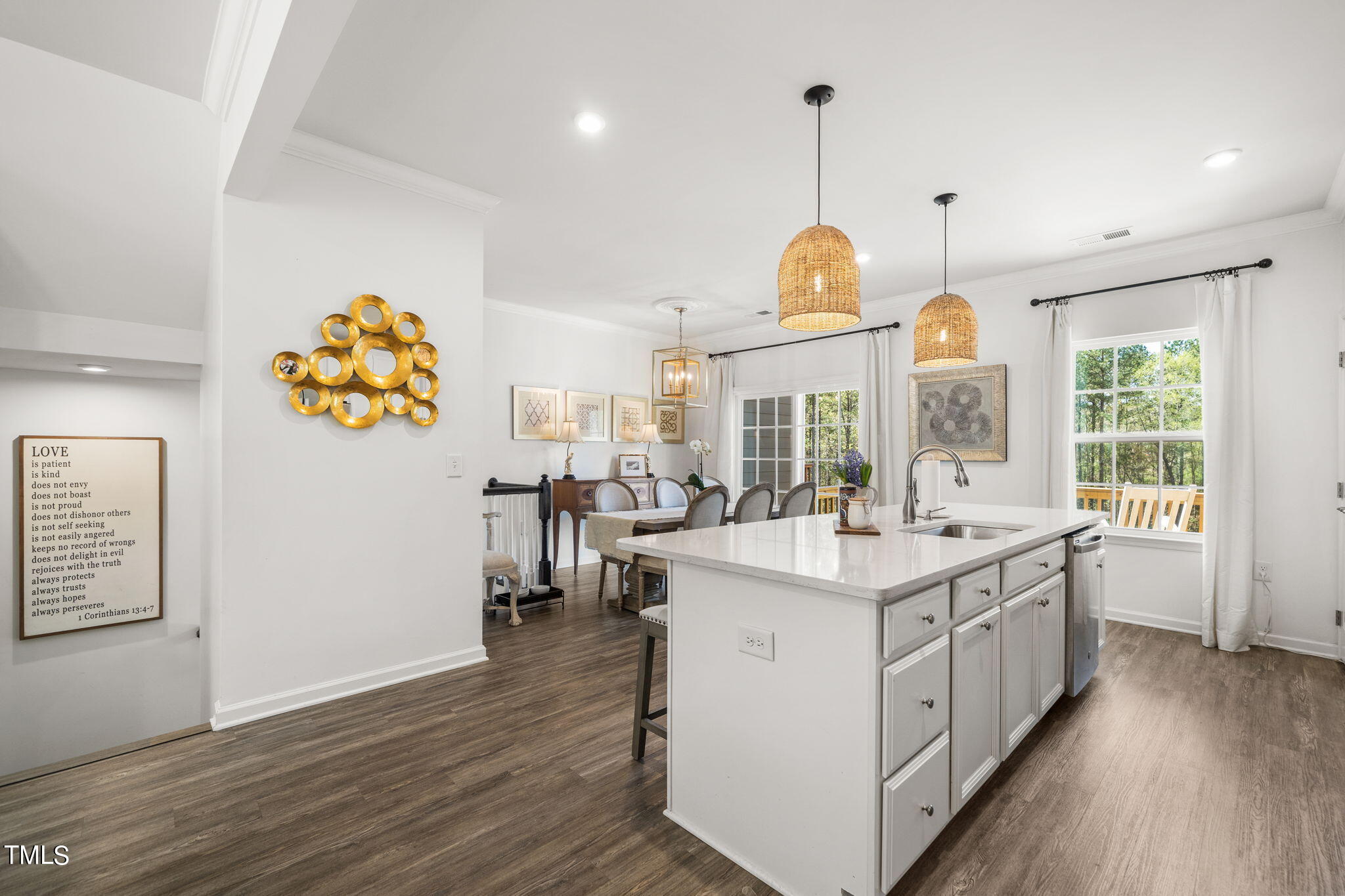 4724 Randall Road Durham, NC 27707 - Photo 11 of 47 a kitchen with a sink and wooden floor