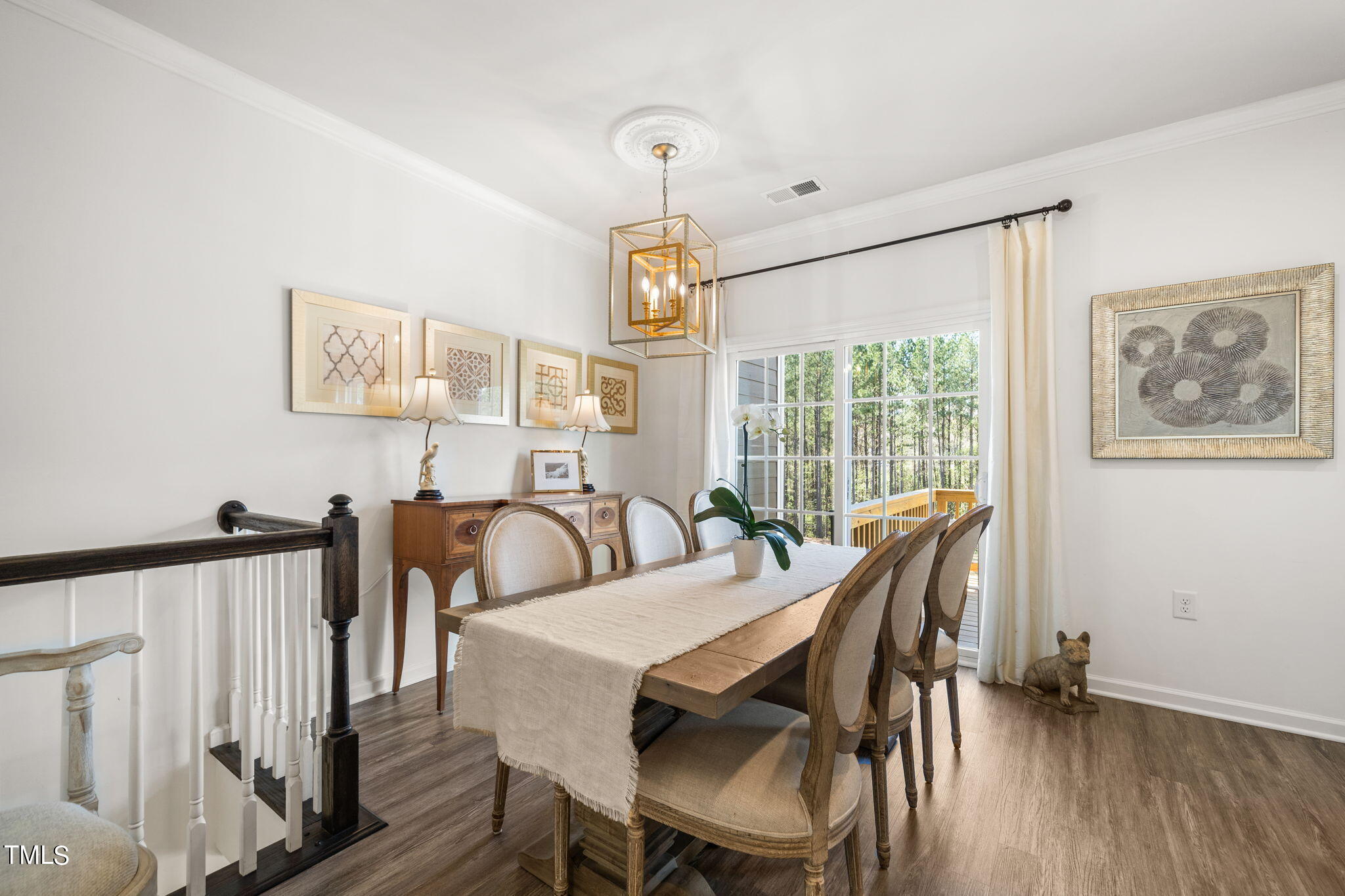 4724 Randall Road Durham, NC 27707 - Photo 5 of 47 a view of a a dining room with furniture window and wooden floor