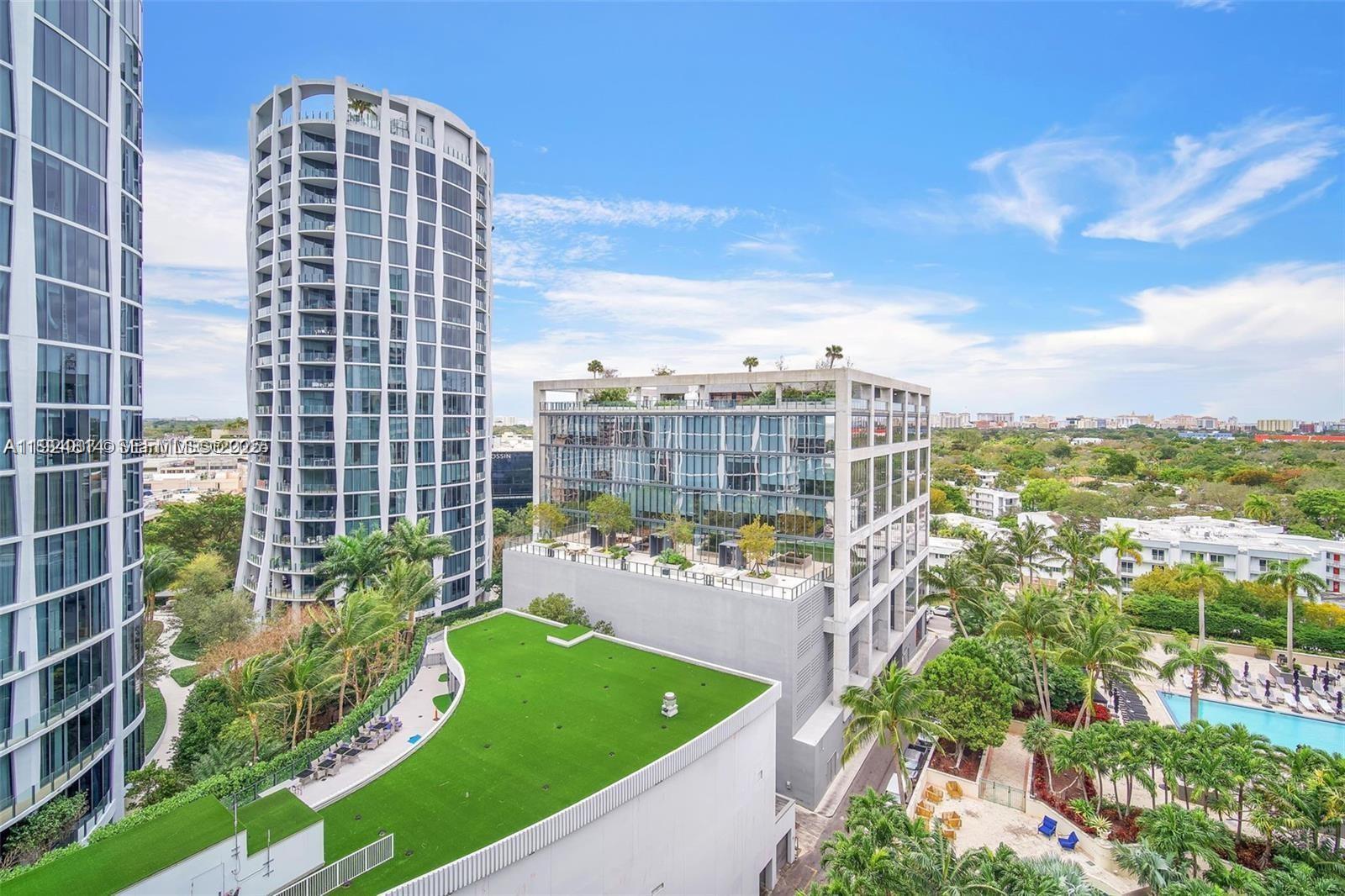 3400 Southwest 27th Avenue, Unit 1105 Miami, FL 33133 - Photo 2 of 24 a view of a city with tall buildings