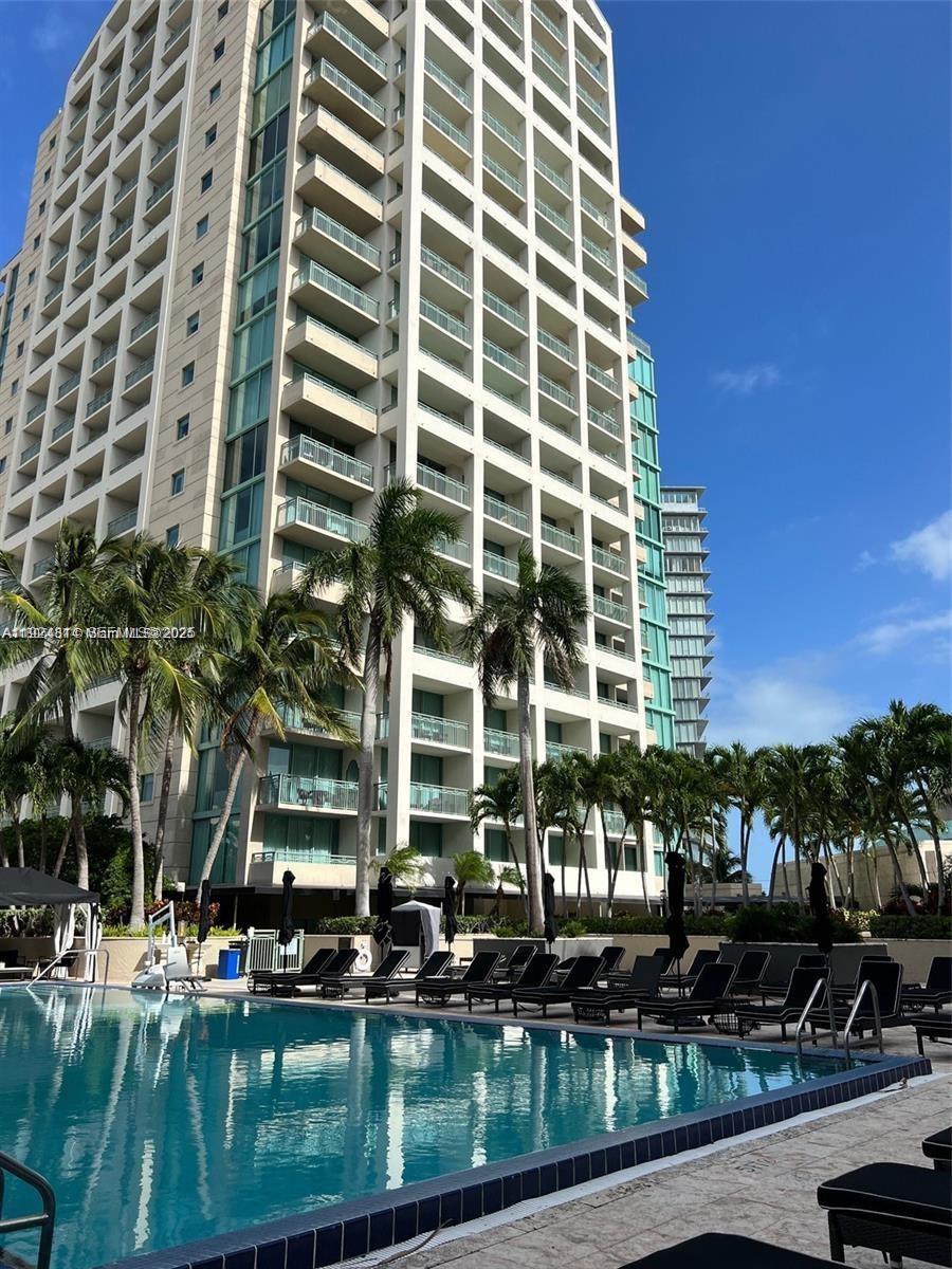 3400 Southwest 27th Avenue, Unit 1105 Miami, FL 33133 - Photo 22 of 24 a view of a tall building