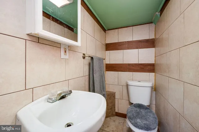 a view of a room with white walls