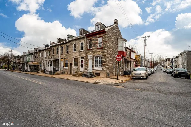 a view of a street with cars