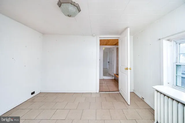 a view of a livingroom with a flat screen tv