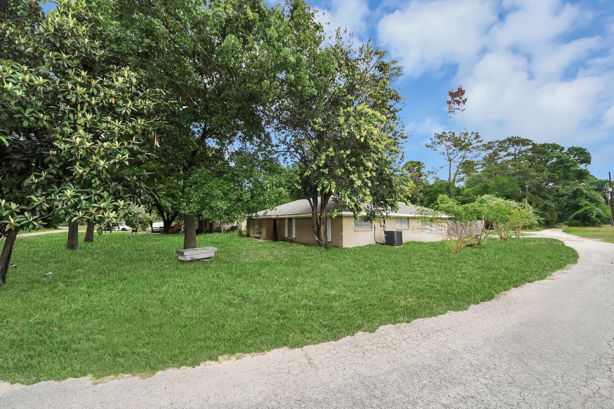 19435 Interstate 45 Spring, TX 77388 - Photo 2 of 24 a front view of a house with a yard