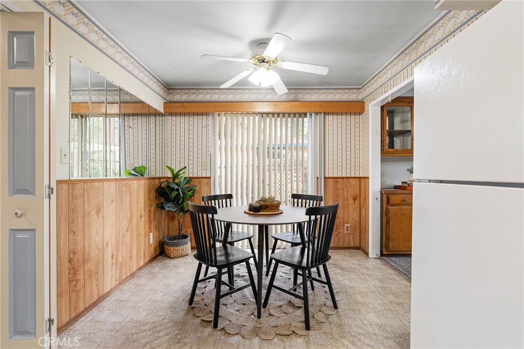 6682 Brook Way Paradise, CA 95969 - Photo 14 of 56 a view of a dining room with furniture and a window