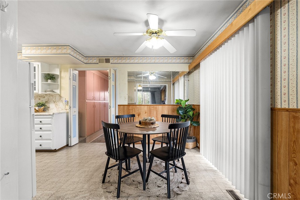 6682 Brook Way Paradise, CA 95969 - Photo 15 of 56 a view of a dining room with furniture and window