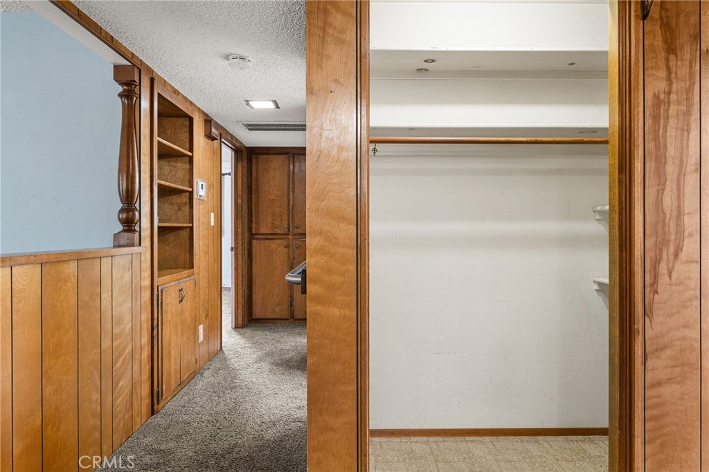 6682 Brook Way Paradise, CA 95969 - Photo 16 of 56 a view of a hallway with wooden shelves