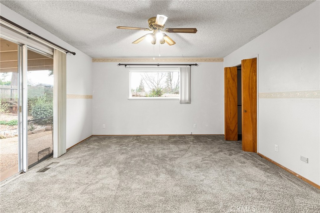 6682 Brook Way Paradise, CA 95969 - Photo 19 of 56 a view of an empty room with a window