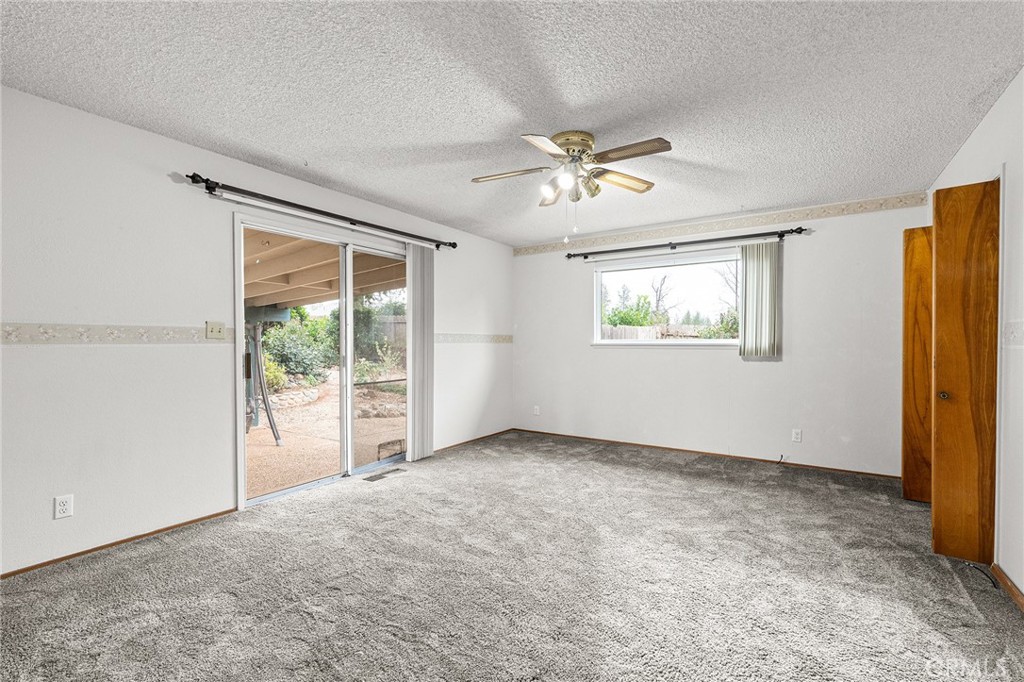 6682 Brook Way Paradise, CA 95969 - Photo 21 of 56 a view of an empty room with a window
