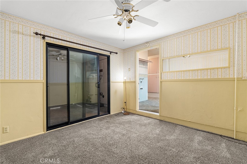 6682 Brook Way Paradise, CA 95969 - Photo 31 of 56 an empty room with closet and chandelier