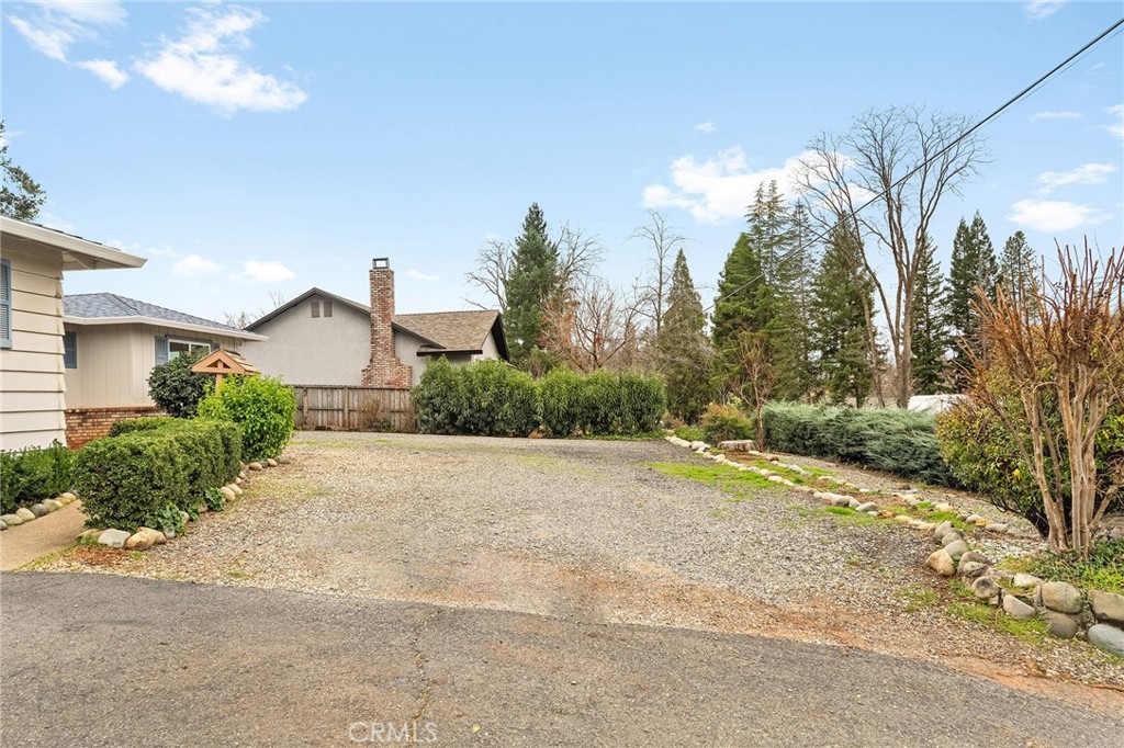 6682 Brook Way Paradise, CA 95969 - Photo 53 of 56 a view of a house with a yard and basketball court