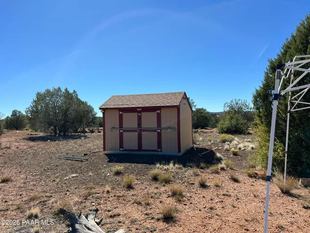 a house view with a outdoor space
