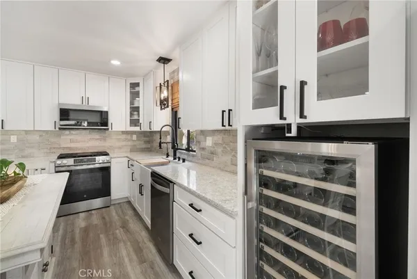 $899,999 | 15 Big Dipper Court, Unit 24, Newport Beach, CA 92663