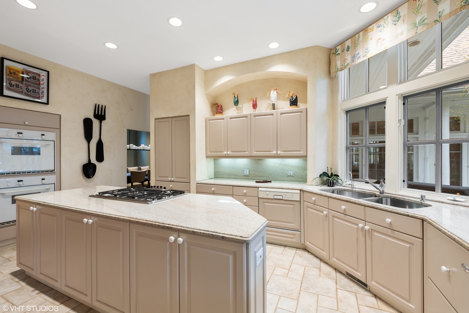 479 Lee Road Northbrook, IL 60062 - Photo 15 of 36 a kitchen with a sink stove and cabinets
