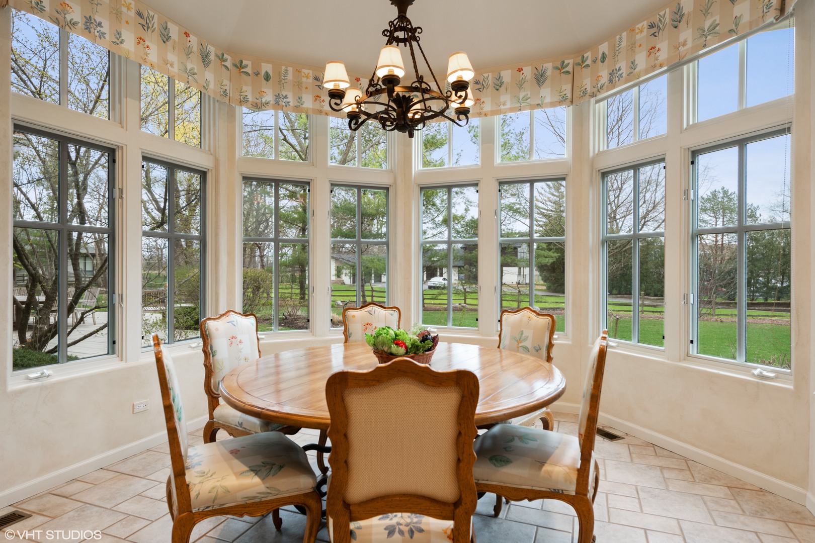 479 Lee Road Northbrook, IL 60062 - Photo 18 of 36 a view of a dining room with furniture large windows and wooden floor
