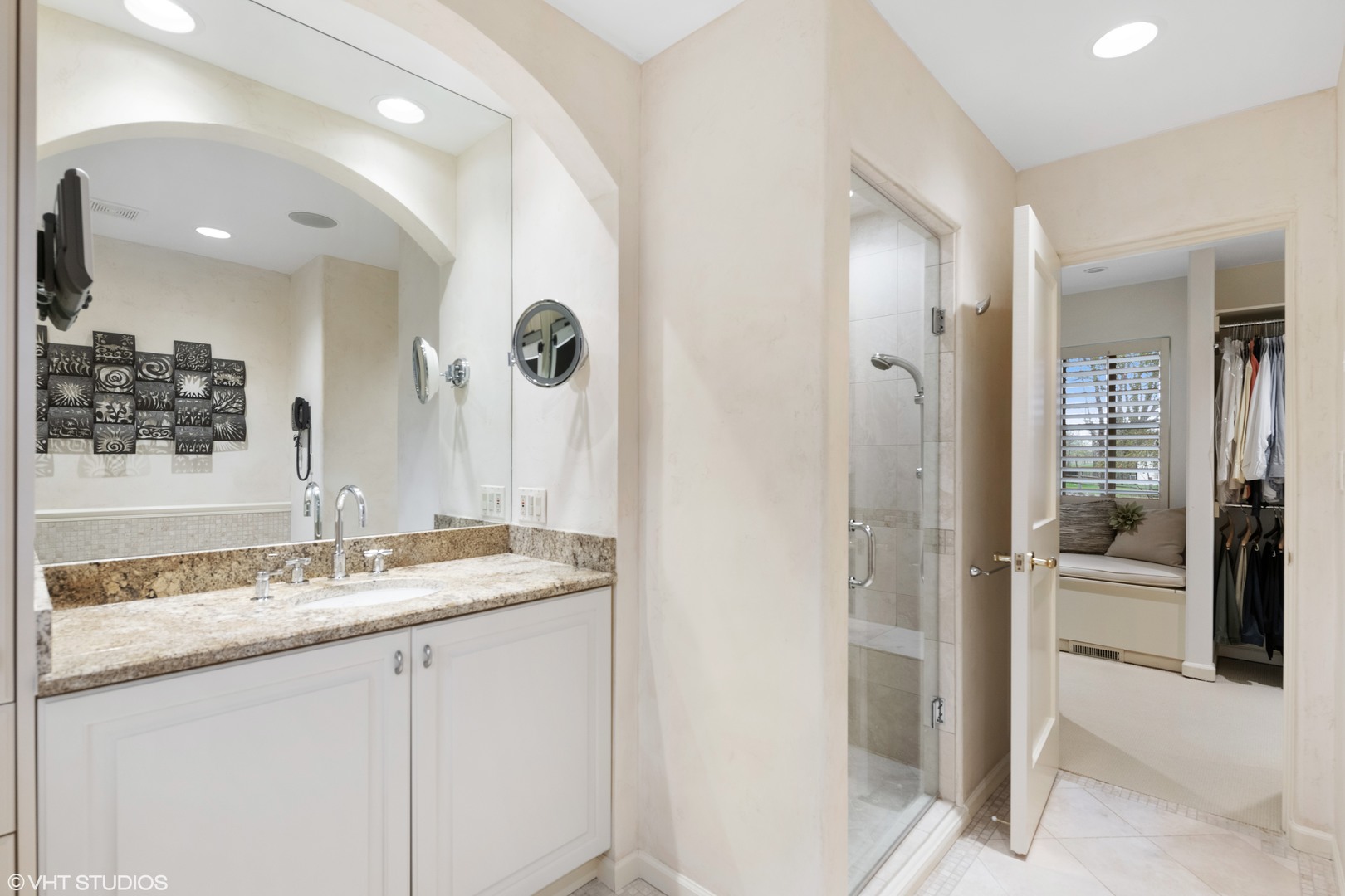 479 Lee Road Northbrook, IL 60062 - Photo 25 of 36 a bathroom with a granite countertop sink mirror and shower