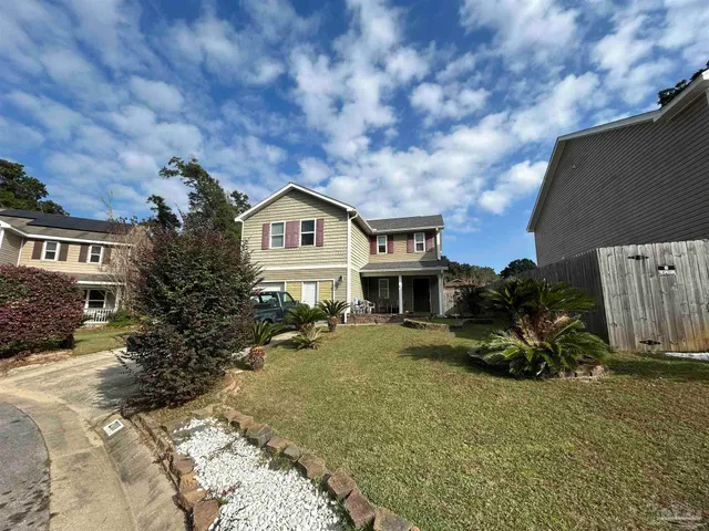 a view of house with a outdoor space