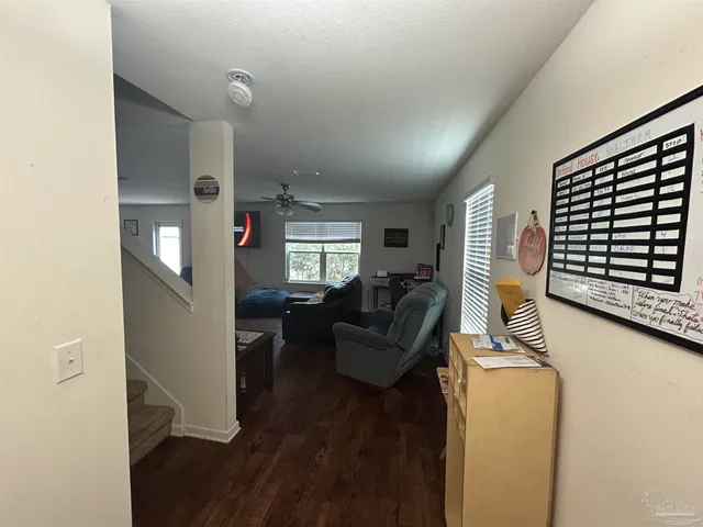 a living room with furniture and a window