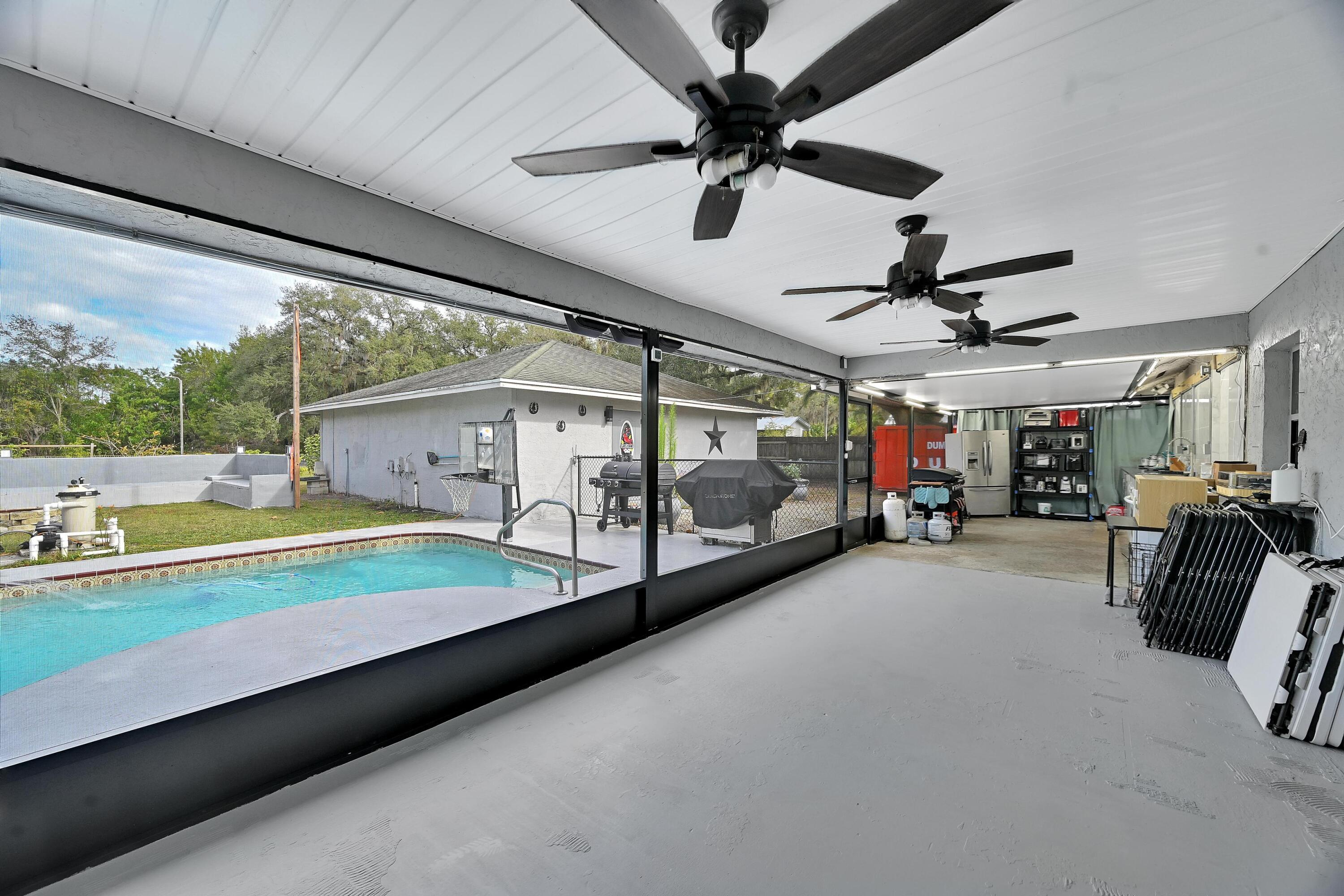 2404 Dade Road Fort Pierce, FL 34982 - Photo 28 of 61 SCREENED PATIO