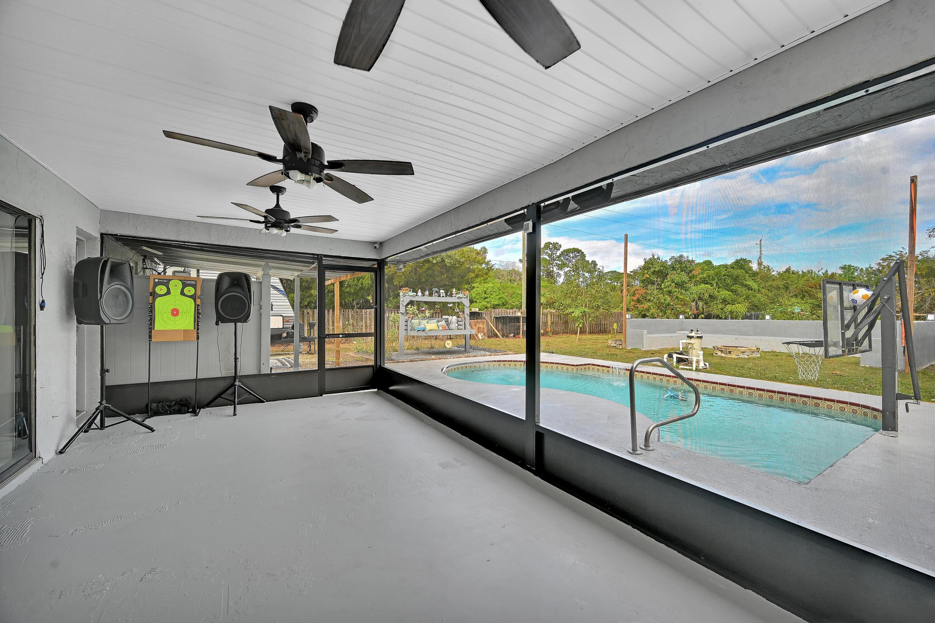 2404 Dade Road Fort Pierce, FL 34982 - Photo 29 of 61 SCREENED PATIO