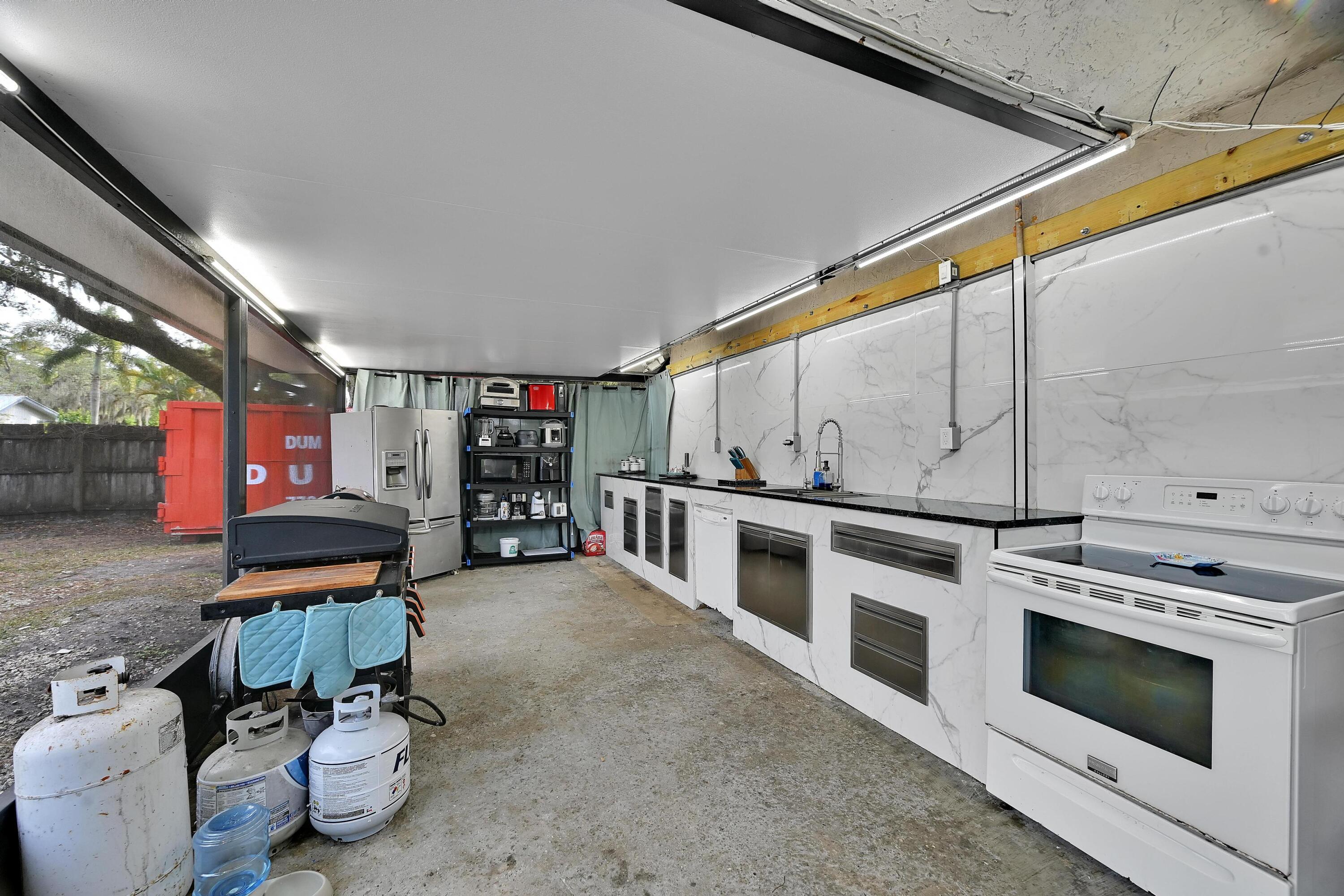 2404 Dade Road Fort Pierce, FL 34982 - Photo 30 of 61 OUTDOOR KITCHEN