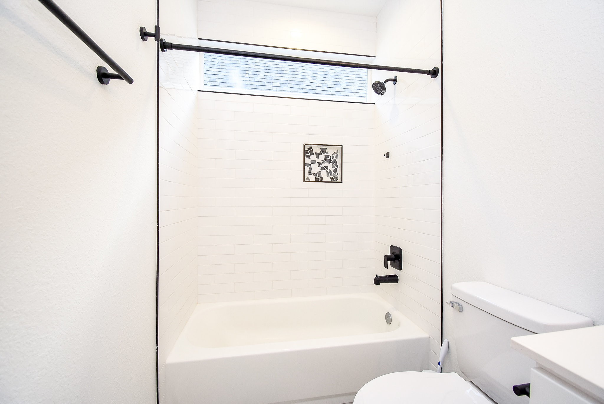 6828 Liverpool Street Houston, TX 77021 - Photo 17 of 32 a bathroom with a shower and a toilet