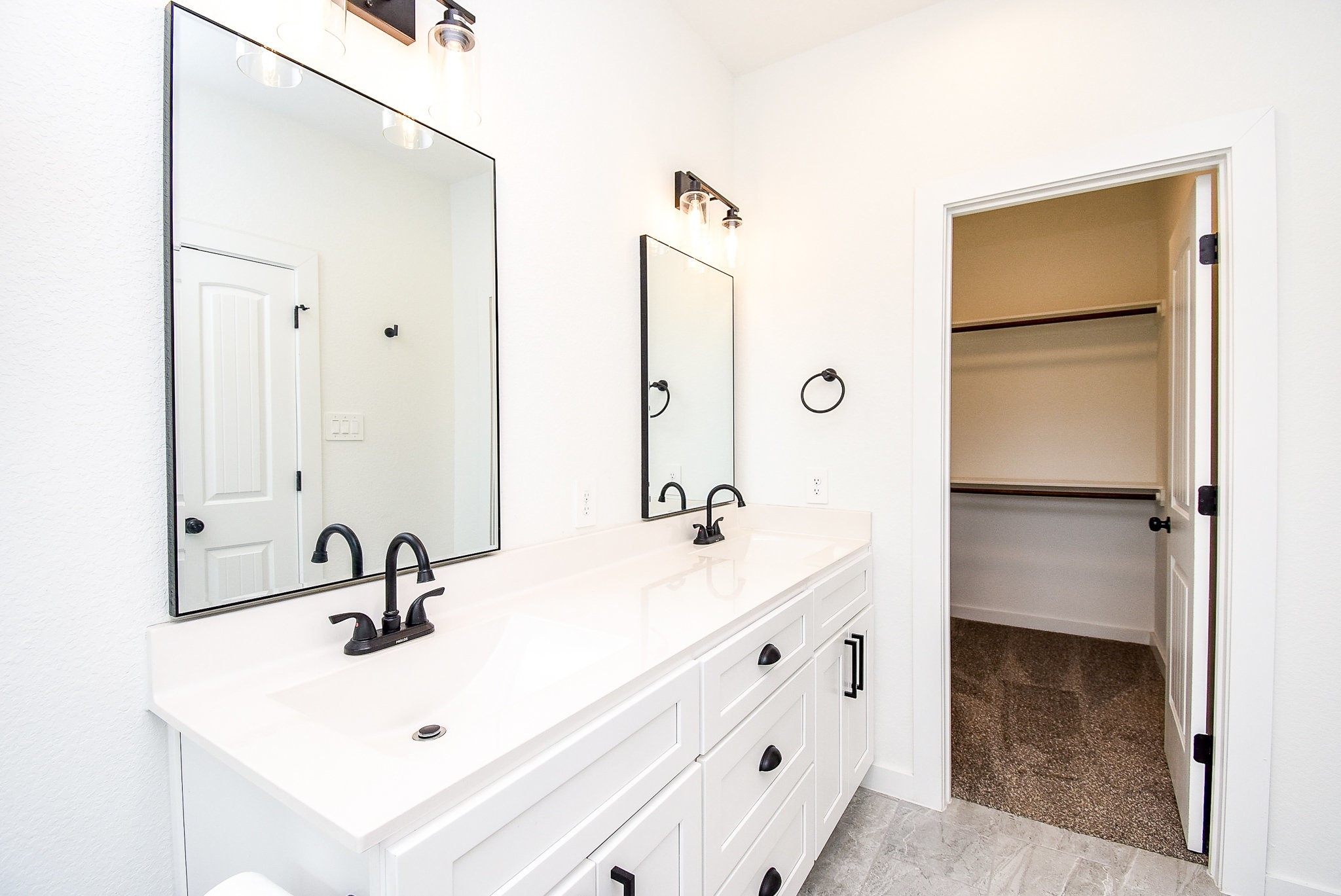 6828 Liverpool Street Houston, TX 77021 - Photo 28 of 32 a bathroom with a sink and a mirror