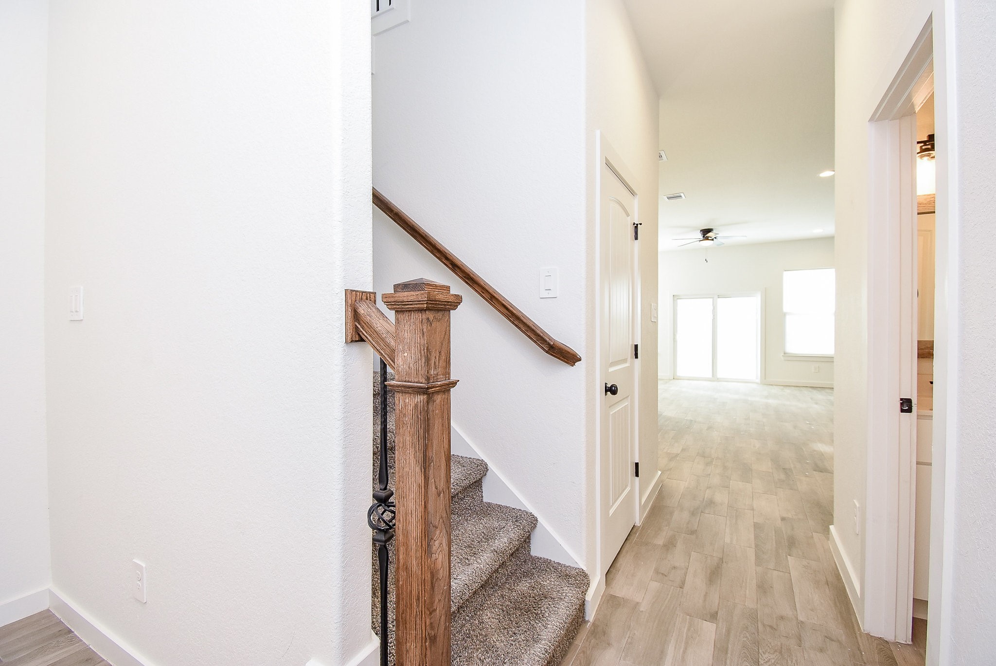 6828 Liverpool Street Houston, TX 77021 - Photo 5 of 32 a view of a hallway with staircase