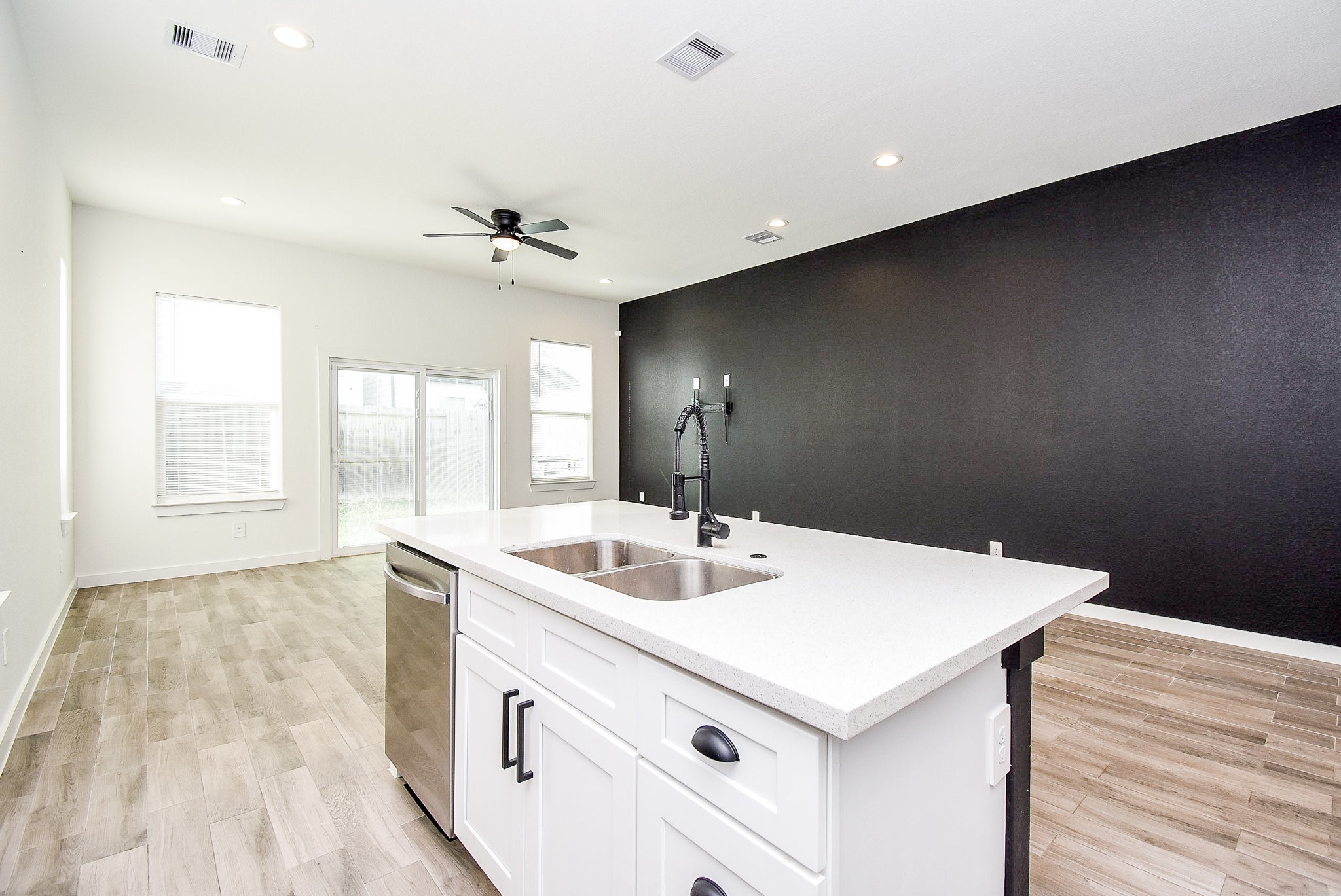 6828 Liverpool Street Houston, TX 77021 - Photo 9 of 32 a kitchen with a sink and a stove