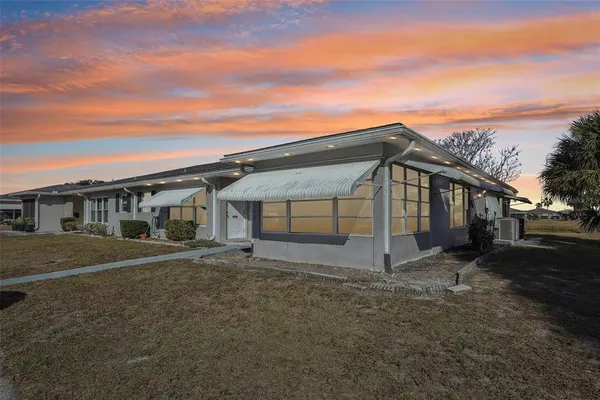 a view of house with outdoor space