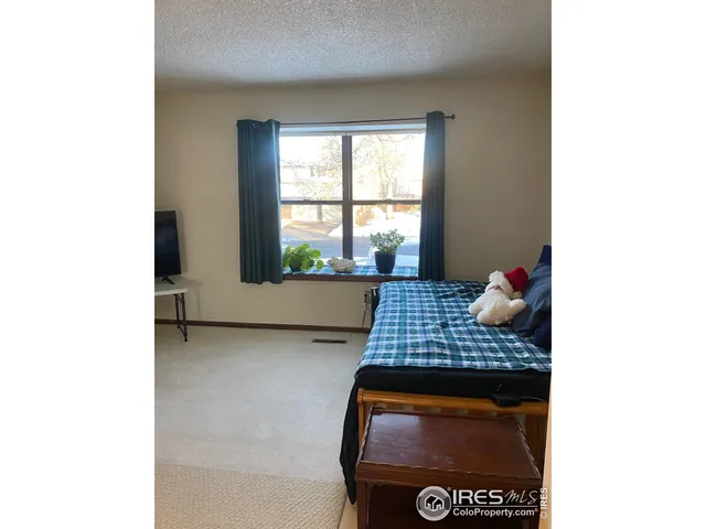 a bathroom with a sink toilet mirror and vanity