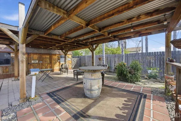 a view of a porch with furniture and floor