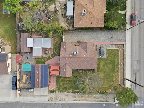 an aerial view of a house with a garden