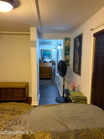 a living room with lots of furniture and a rug