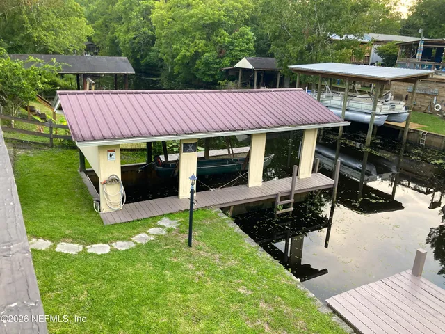 a view of a backyard with a deck