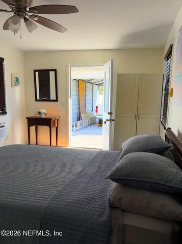 a backyard of a house with seating space