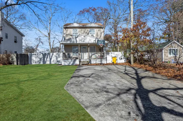 a view of a building with a yard