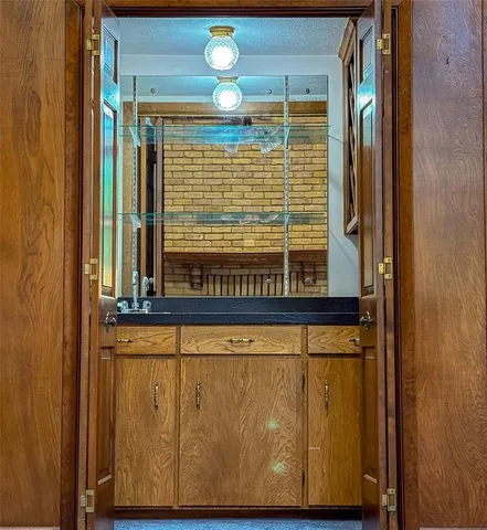 a view of a door and a window