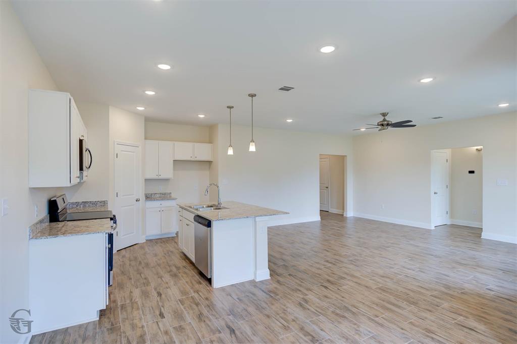 1210 BAYOU BAY Court Frierson, LA 71027 - Photo 7 of 21 a view of kitchen with sink and refrigerator