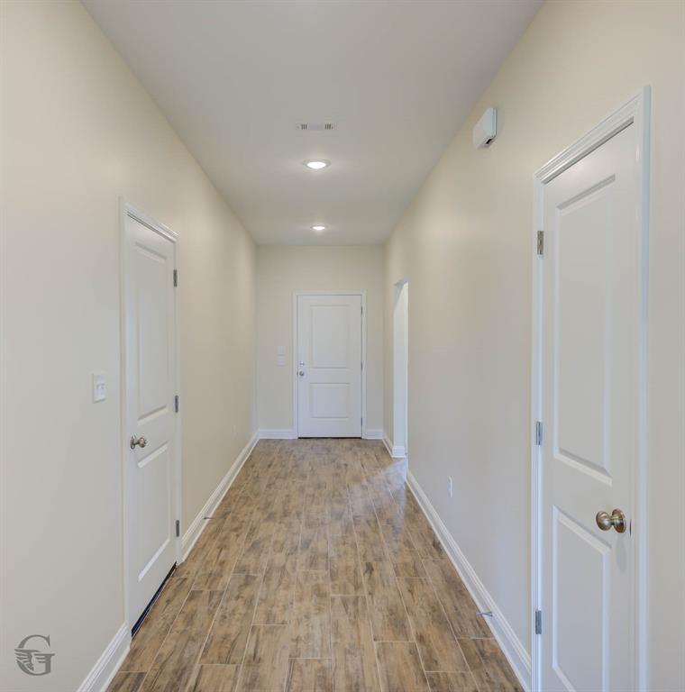 1210 BAYOU BAY Court Frierson, LA 71027 - Photo 9 of 21 a view of hallway with wooden floor