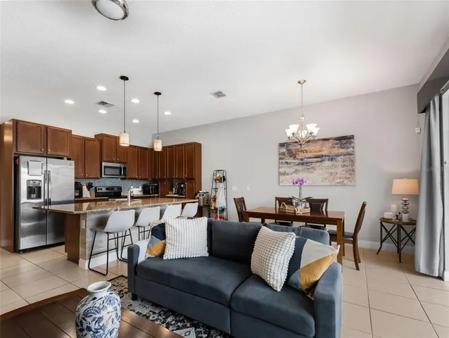 a view of a dining room with furniture