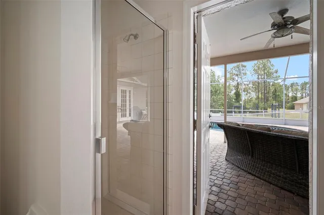 a kitchen with stainless steel appliances granite countertop a refrigerator and a stove