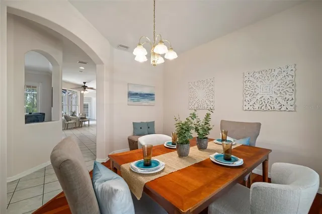 a spacious bedroom with a bed and a window