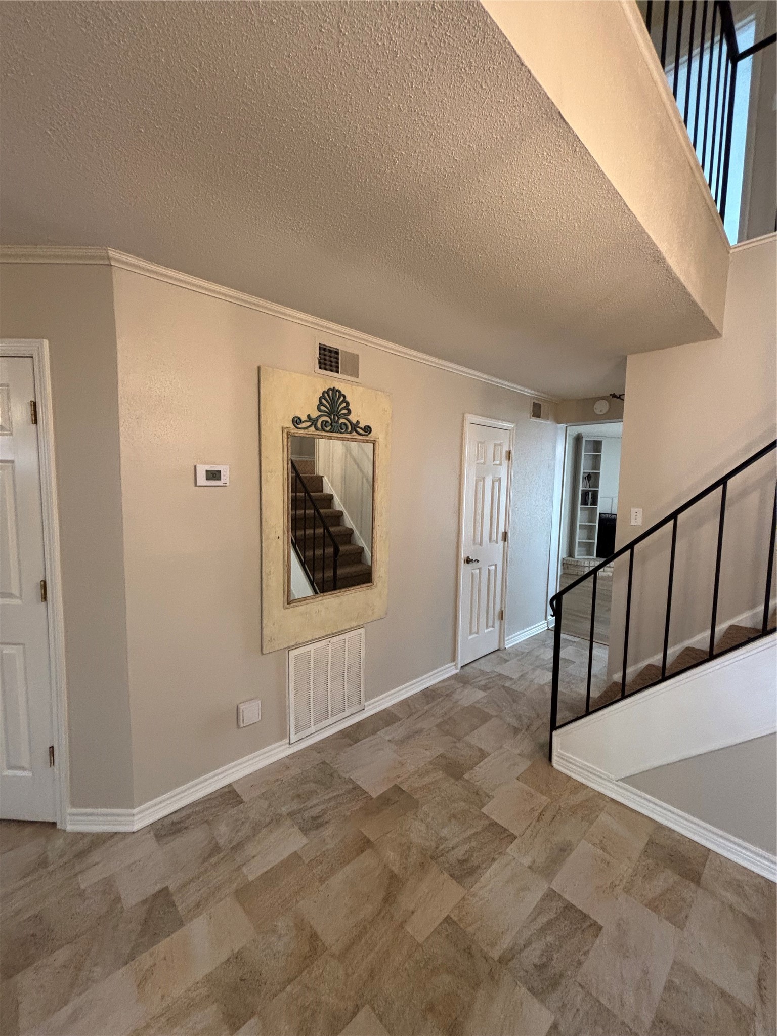 14515 Wunderlich Drive, Unit 315 Houston, TX 77069 - Photo 13 of 37 Hall area between Dining & Living