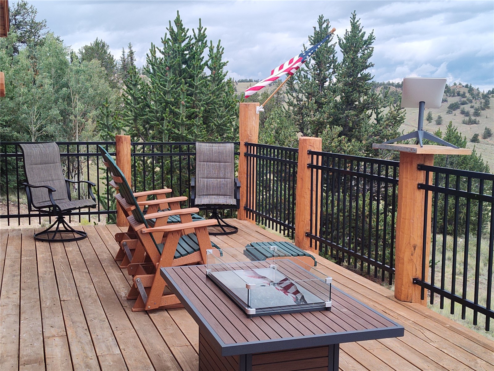 5 Arland Road Como, CO 80456 - Photo 7 of 33 a view of a balcony with wooden floor and outdoor seating