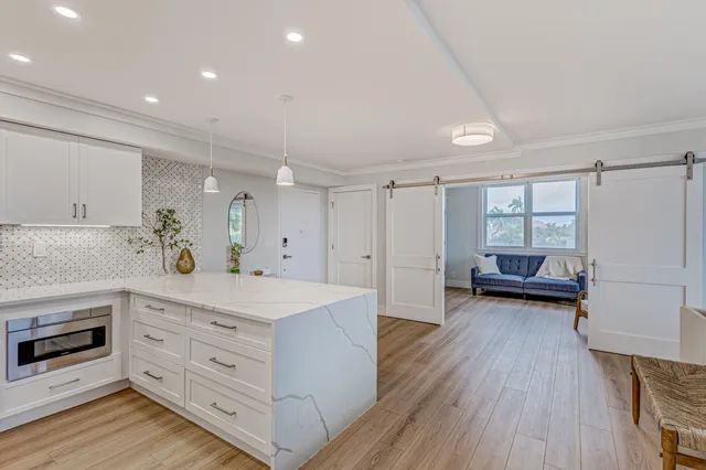 a view of living room with furniture and window
