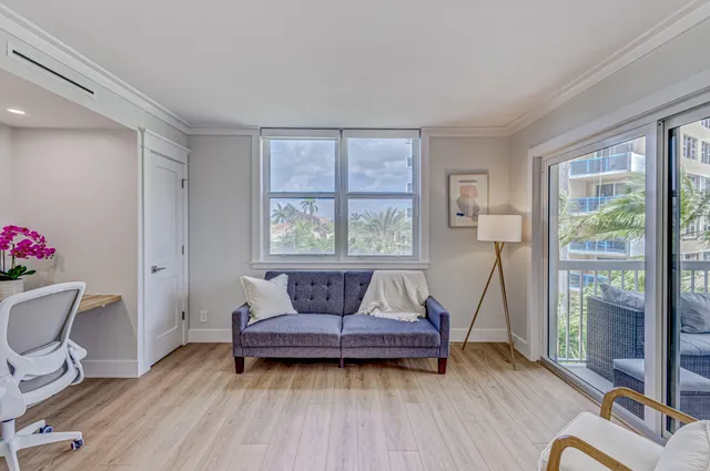 a living room with a couch and a table
