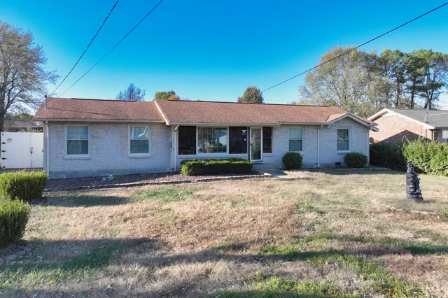 a view of a backyard with a garden