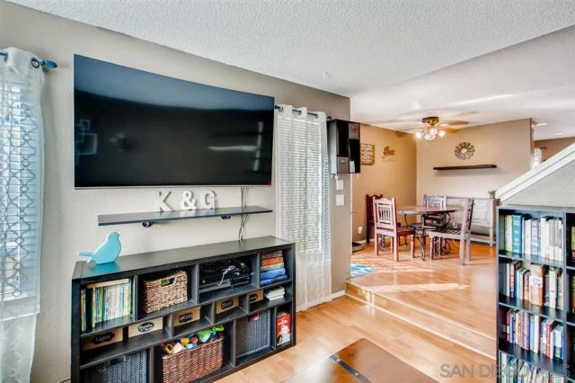 a living room with television and a flat screen tv